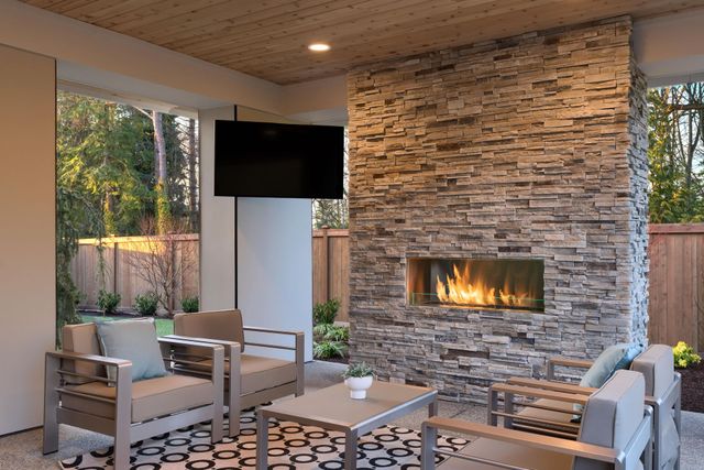 Outdoor living room with fireplace